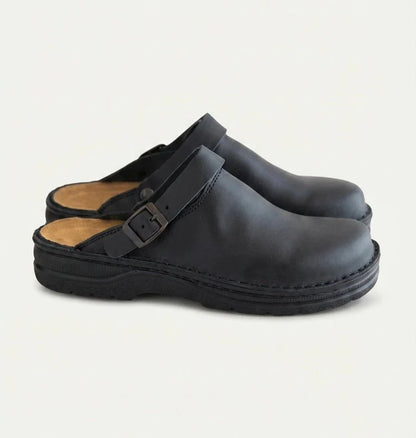 black eluxeri clogs from the side