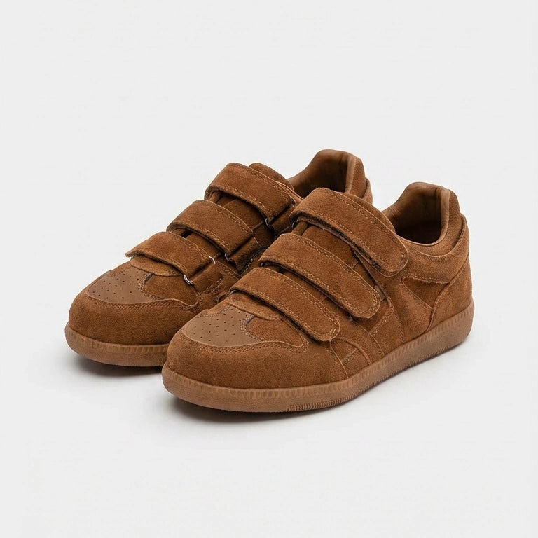 Pair of brown eluxeri easewalk sneakers with velcro straps on a white background